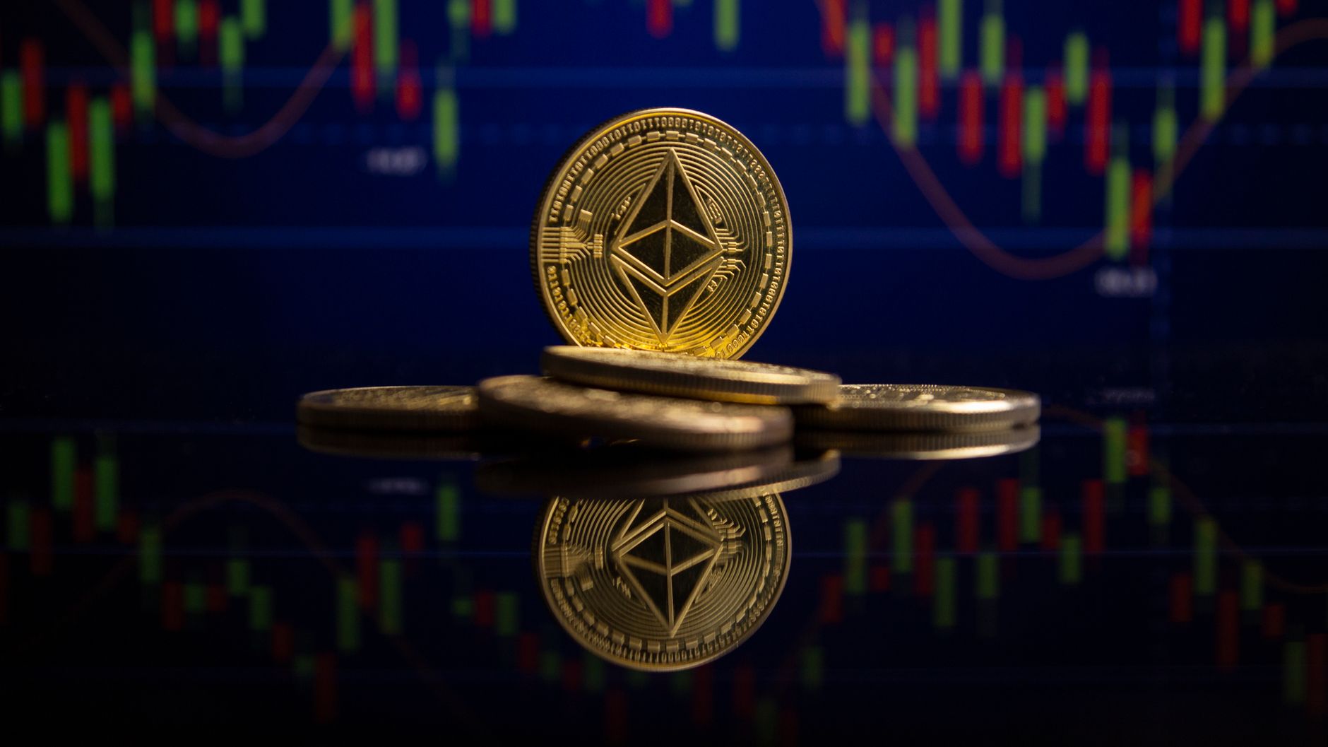 Ilustrasi: Ethereum coins on reflective surface with stock market chart behind, showcasing cryptocurrency trading.